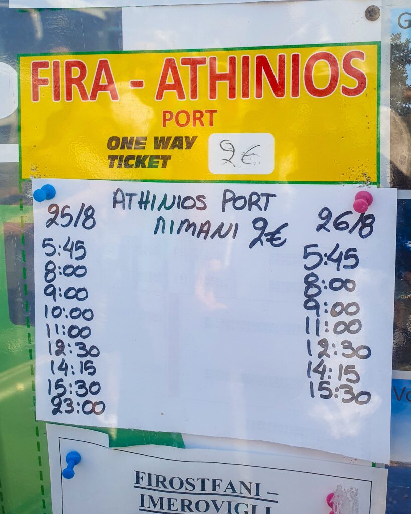 A sign of the bus timetable for the bus from Fira to Athinios in Santorini, Greece "A Complete Guide To The Santorini Public Transport System"