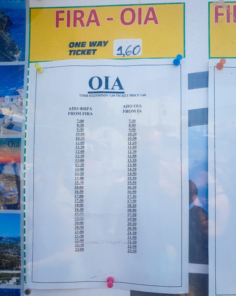 A sign of the bus timetable for the bus from Fira to Oia in Santorini, Greece "A Complete Guide To The Santorini Public Transport System"