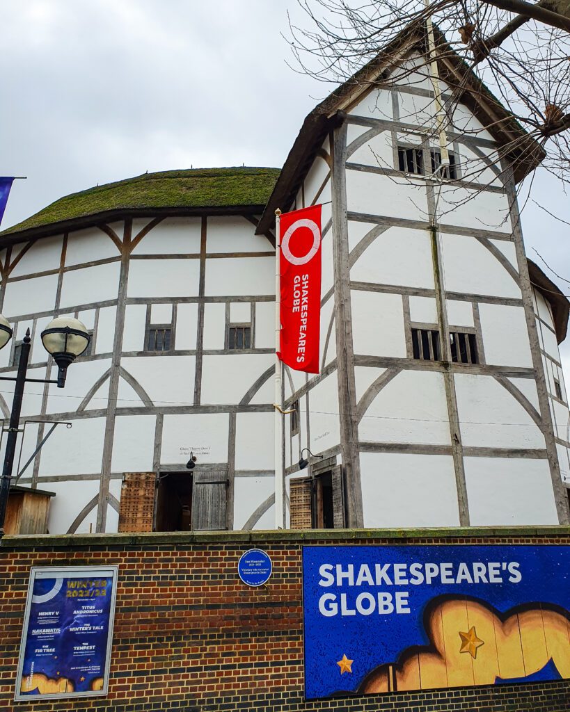 Shakespeare's Globe in London, England that is a white round building with wooden beams running through it "How to Have the Best Time in London (For Free!)"